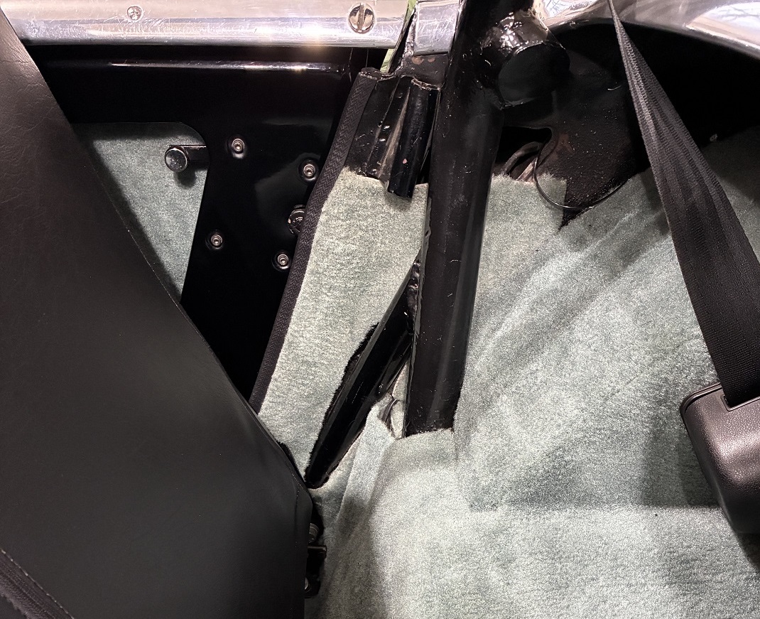 Cross member welded to frame rails for transmission mount.